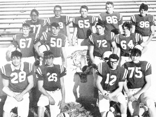 WHO SAID THE NUMBER 13 IS UNLUCKY? The 1969-1970 Senior football members were (front row, from left) Dave Elliston, Rick Sanders, Gary Scott, Don Lowry; (second row) Jim Kee, Bob VanEaton, Mike Muir, Howdy Webster; (back row) Lawrence Cadoret, Gale Maddy, Martin Davis, Gary Baxter, and Bill Schmitz.