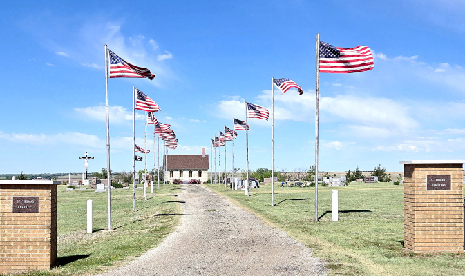 THE AVENUE OF FLAGS at the St.Thomas Cemetery created a beautiful tapestry of remembrance on Memorial Day to honor the courage and sacrifice of those who shaped our freedom.