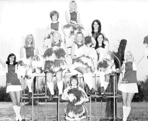 THE 1971-72 SHS POM PON GIRLS entertained at halftimes of the football and basketball games for the Tigers. Pictured are (top) Sara Marshall, (second row, from top) Connie Poore, Katy Laska; (third row, from top) Pam Wall, Mendy Baughman, Candy Spencer, Jolene Desbien, Kathy Smith, Marty Currie; and (standing in front) Tina Rogers.