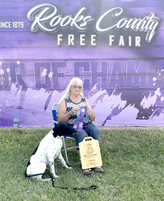 KATHY CREIGHTON and her German Shorthaired Pointer, KC, participated at this year’s Rooks County Free Fair. In Adult Showmanship they won a Blue ribbon with a score of 99 out of 100. In Obedience they also received a Blue ribbon with a score of 194 out of 200. The duo received Grand Champion Overall and a ‘Top Dog’ cutting board sponsored by Kenny and Betty Hrabe.