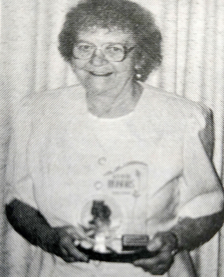 IT’S AVON CALLING! Everyone’s favorite Avon representative, Wanda Kreller, received two honor plaques for sales and service with Avon at the annual President’s luncheon in Garden City in the spring of 1994. She received a dozen roses for sales and services and a pin for being a member of the Avon President’s Council.Who still has bottles of perfume that Wanda sold to you?