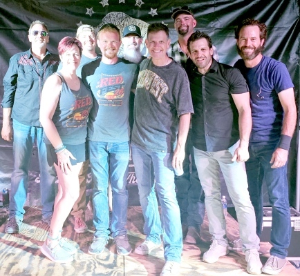 RED FEST ORGANIZERS ANNE WILLIAMS AND COLTON WILLIAMS, are pictured along with members of the Blaine Younger Band which played at Red Fest 2026. The fun event was held in the Lower City Park on Saturday. Pictured front row, from left are: Anne, Colton, Blaine Younger, and Eric Pfeifer; and back row, from left are: Rex Striggow, Garrett Reser, Ryan Tittsworth, Kenny Zahn, and Trent Dansel. (Courtesy Photo)