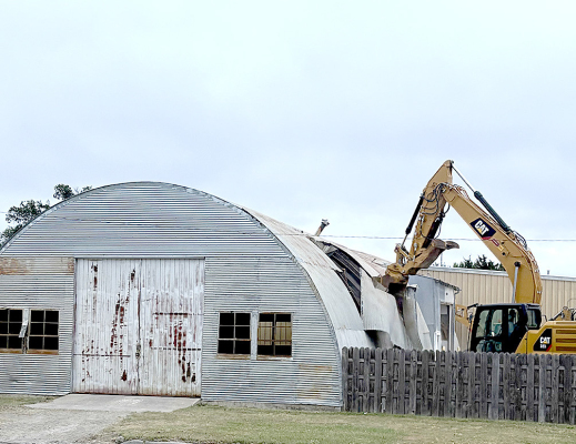 THE ROOKS COUNTY HIGHWAY DEPARTMENT’S large round building is no more. The crew demolished the building on Monday, September 21st, to make room for a larger storage facility and office.