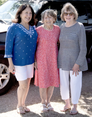 HONORING HEROES TOGETHER: Cheryl Dunning of Leawood, Wilma Turnbull of Stockton, and Char Heenan of Monument, Colo., enjoyed reminiscing after Stockton City Cemetery’s Memorial Day Services on May 25.