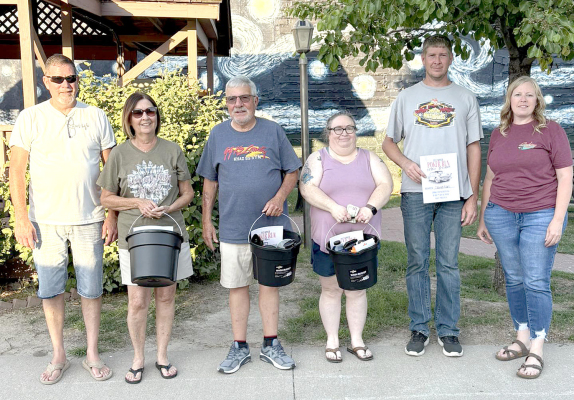 THE 2025 CRUISE NIGHT POKER RUN ORGANIZERS, Tim Johnston (left) and Helen King (right), are pictured with the winners of this year’s event following the presentation of prize money and car care products. From left are Tim; Addie Foster, Worst-Hand; Don Hamit, 3rd place; Marlyn Bryant, 2nd place; David Earl, 1st place; and Helen. (Courtesy Photo)