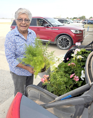 BERTHA MCGANN, 85, of Palco has been a devoted participant in the Rooks County Free Fair for decades. On Monday, she arrived with a beautiful selection of plants for the Open Class division, continuing her long-standing tradition of supporting the Fair each year.