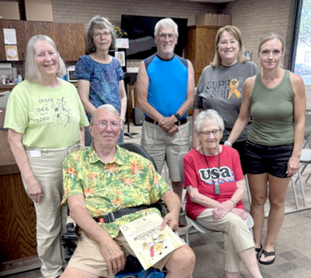 SPELLING BEE WINNERS, hosts, and judges. Front row, Frank Austin (Champion), Hazel LaPorte. Back row Leslie Fogle, judges Barbara Scala and Jerry Wilson, Host Cheryl Copland, Jennie Hovis.