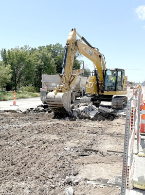 WORK IS PROGRESSING on the U.S. Highway 24 project in Stockton from Elm Street to Pleasant Street. The heavy equipment is making short work of clearing out the material in the two middle lanes while the outside lanes are set up for traffic.