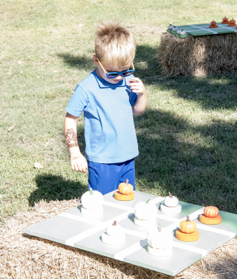ALEX BERKLEY enjoys a game of Tic Tac Toe with Halloween-themed pieces at this year's Stockton Pumpkin Patch Festival, held Saturday and Sunday, October 10 and 11.