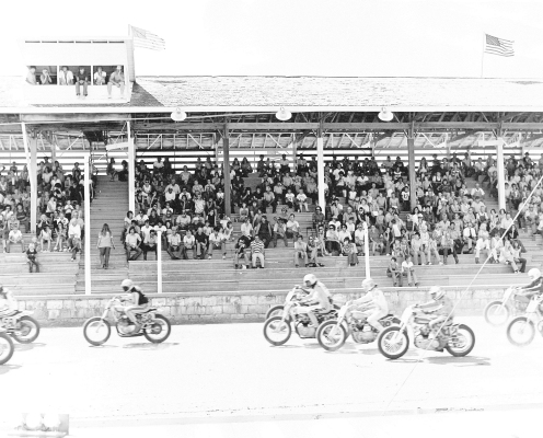 THIS GRANDSTAND PHOTO captures the 1970s, showcasing one of the standout attractions of the Rooks County Free Fair— motorcycle racing! Over 100 years of racing, the Fair has welcomed not only nationally ranked racers, showcasing their skills and daring maneuvers, but also local talent, each rider bringing their own unique flair to the track. Do you recognize any faces in the stands? The staff here at the Sentinel-Times recognizes a number of people.