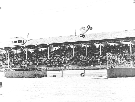DURING THE ROOKS COUNTY FREE FAIR IN THE 1960s, the Swenson Thrillcade had the crowds flocking to the grandstands and on the edge of their seats to watch their heart-stopping aerial maneuvers and gravity-defying stunts!