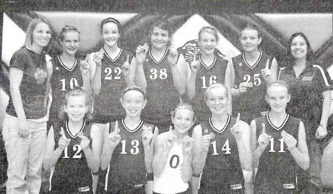 THE STOCKTON ATEAM VOLLEYBALL GIRLS captured the 2012 Mid-Continent Elementary League Volleyball Tournament by defeating Norton in the Finals, and came away with a perfect 13-0 record for the season. Pictured are (front row, from left) Hannah Wildeman, Haven Hamilton, Madalyn Billinger, Cecelia Beck, Shayanne Wente; (back row) coach Jessica Billinger, Delayne Colburn, Emily Conyac, Cassie Jackson, Tori Bouchey, Taren Kuhlmann, and coach Kayla Bonebrake.
