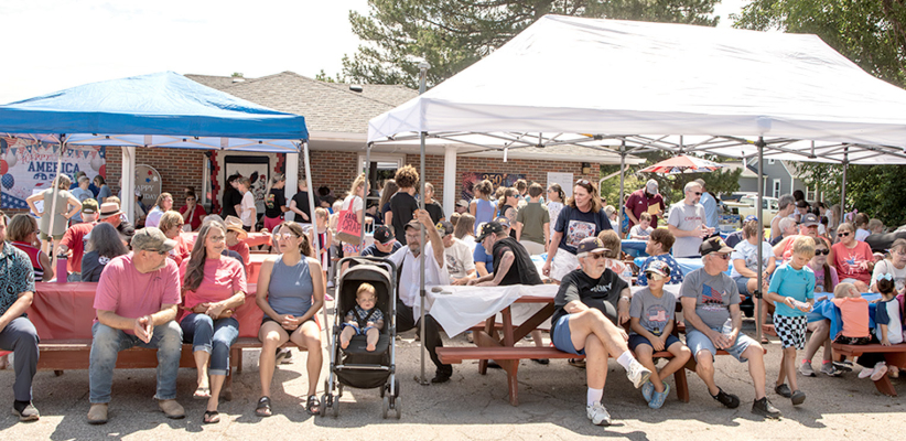 PEOPLE OF ALL AGES gathered in Plainville last Wednesday for a block party to celebrate America’s 250th birthday.