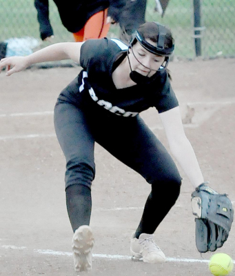 PITCHER CORYN HAHN looks to make a play on the ball during RoCo Softball action against Beloit on May 10 in Plainville.
