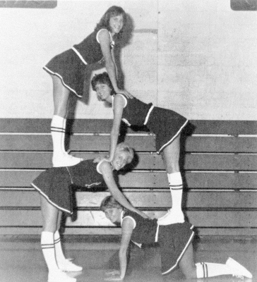 PUMPING UP THE SPIRIT for the Plainville Cardinals in 1985 were the B-Team Cheerleaders (top to bottom) Lanette Hutton, Shawn Fellhoelter, Michelle Fisher, and Lora Gilliland.