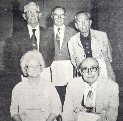 IN MAY OF 1983, Rupert Dryden was recognized for 50 years as an active member of the Masonic Lodge. Pictured are (seated) Maude Dryden, who placed the 50-year pin on her husband's coat lapel, Rupert; (standing, from left) Paul Roelfs, District Deputy Grand High Priest District 14, most excellent Grand Chapter RAM of Smith Center Roy Lumpkin, and Duffie Hindman. Roelfs and Hindman were also 50-year members of the Newahcuba Lodge No. 189 of Stockton.