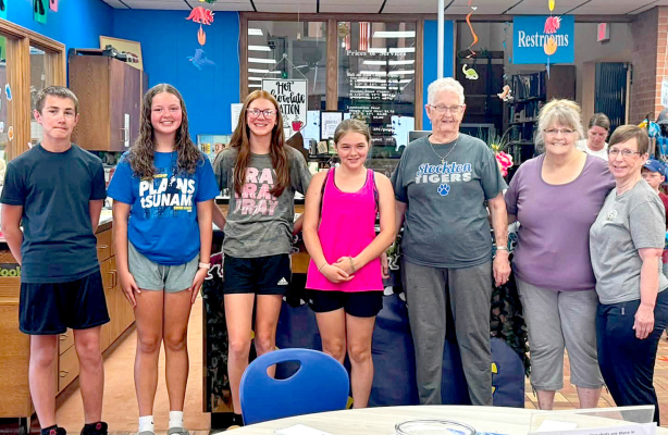 PICTURED ARE THE VOLUNTEERS who helped make the Stockton Public Library Summer Reading Program fun and a great success. They are (from left) Hudson Sarrenen, Tessa Look, Omree Dibble, Emma Freeman, Charlotte Sammons, Tammy Petterborg, and Deb Kring. Not present for the picture are Janie Lowry and Susan Gartrell, who helped out during Stem week, and Makinley Riener who helped on Thursdays.