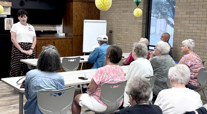 LAURIE AUGUSTINE representing the Rooks County Health Center at Talk With A Doc during the Adult Social/Coffee hour on Tuesday.