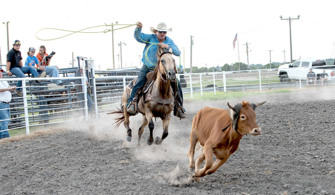 ROPE ‘EM, COWBOY! The Sylvan Sales team placed second at the Free Ranch Rodeo held on Wednesday evening of the Rooks County Free Fair.