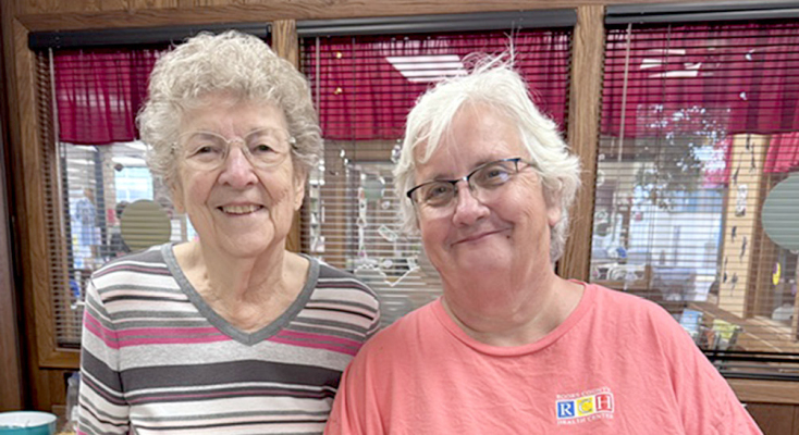 Vertabell Hathaway and Jeanie Rolfe all smiles at adult social/ coffee hour Tuesday.