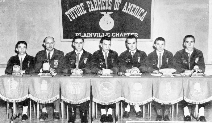 THE 1961-1962 PLAINVILLE FFA CABINET MEMBERS were (from left): sentinel Danny Dix, advisor Mr. Marvin Hachmeister, reporter Fred Kleinschmidt, vice president Ron McKown, president Craig Carmichael, secretary Darrell Dix, and treasurer Larry Havlas.