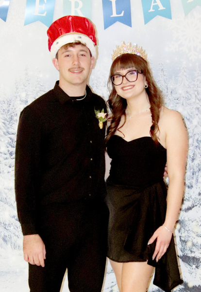THE PLAINVILLE HIGH SCHOOL Winter Glacade King and Queen, Tucker Rudman and Lucia Longo, were crowned last Saturday night at the annual festivities. (Yearbook Staff)