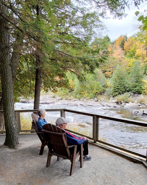 BOB AND NANCY BECKER enjoyed sitting in Adirondack chairs in the Adirondack Mountains.