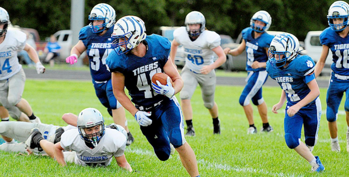 SENIOR RYLAN BASART scored Stockton’s second TD of the game against Thunder Ridge last Friday at Tiger Stadium. Other Tigers in on the action were: Ryan Mongeau, #34, Zach Young, #9, Hayden Hilbrink, #2, and Jace Hartman, #16.