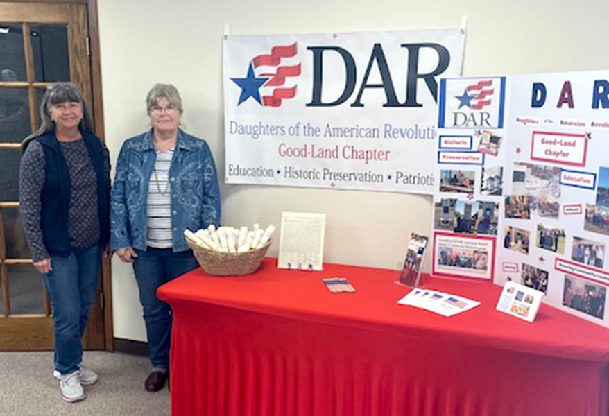 THE ROOKS COUNTY HISTORICAL MUSEUM in Stockton has opened a new temporary display for the DAR organization throughout the month of April. Pictured are Jan Lohr and Joy Hayden.