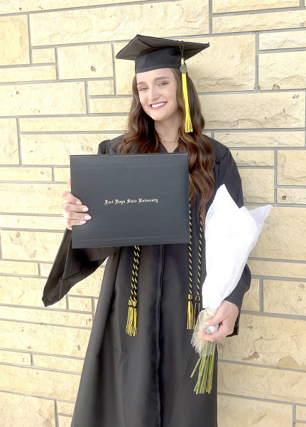 TATUM HAMILTON received her Bachelor of Science degree in Early Childhood Education on Saturday, May 11th, from Fort Hays State University.