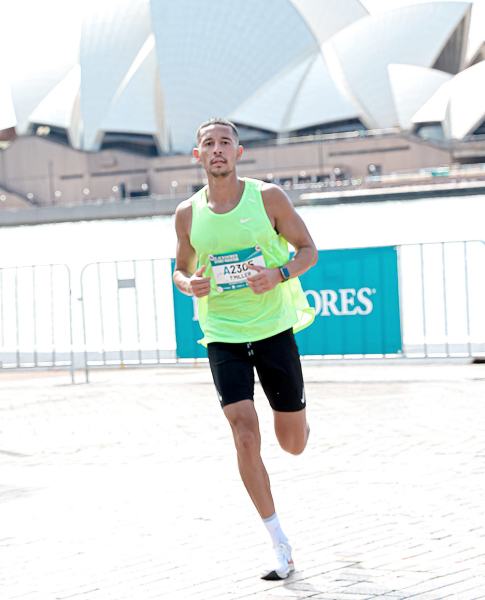 TRENTON MILLER ran his first-ever marathon in Sydney, Australia on September 18. The 26.2-mile course took him past several of the area’s famous landmarks, including the Sydney Opera House (background), which is one of the most distinctive buildings in the world. (Photo Courtesy of USA Basketball)