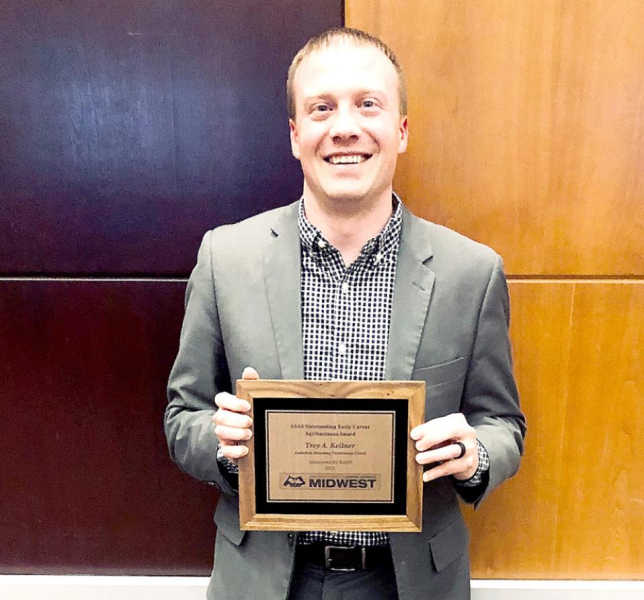 DR. TREY A. KELLNER rceived the Outstanding Early Career Agribusness Award during the ASAS Midwest Section Meeting held March 14-16 in Omaha, Neb. Kellner was a 2006 graduate of Stockton High School.