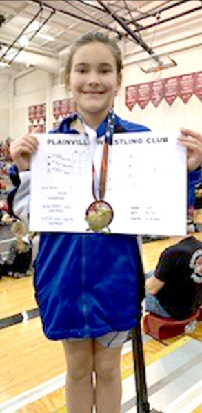 MYA TREVINO placed 1st in the 12 &amp;amp; Under Novice 80-87-lb. division at the Planville Open/Novice Wrestling Tournament held Saturday, February 8th, at Plainville.