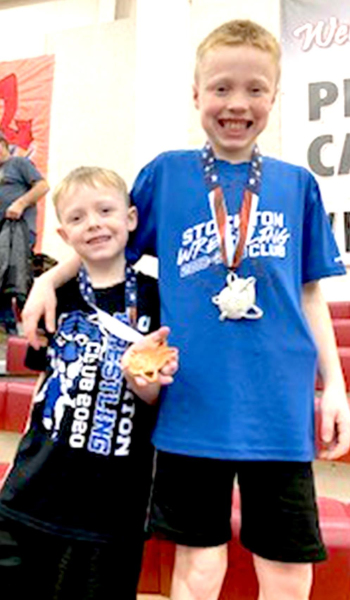 BROTHERS BLAKE AND ZEKE BALTHAZOR recently competed in the Plainville Open/Novice Wrestling Tournament Saturday, February 8th, at Plainville. Blake (left) placed 4th in the 6 &amp;amp; Under 43A-lb. division, while Zeke (right) placed 2nd in the 10 &amp;amp; Under 64-67-lb. division.