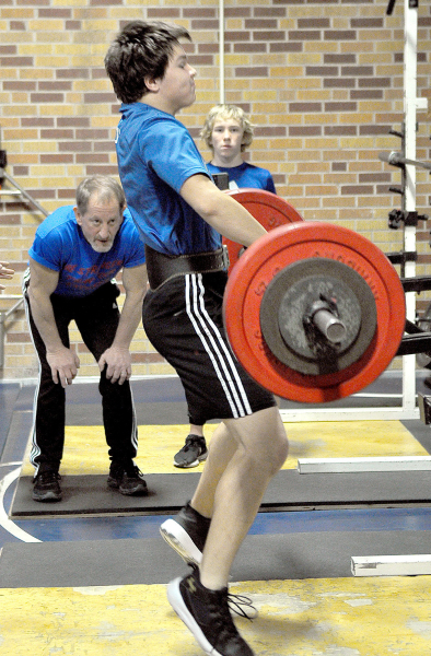 ZACH YOUNG gives it all he’s got while performing the clean lift at the virtual powerlifting meet. His best attempt for the day was 215 lbs.