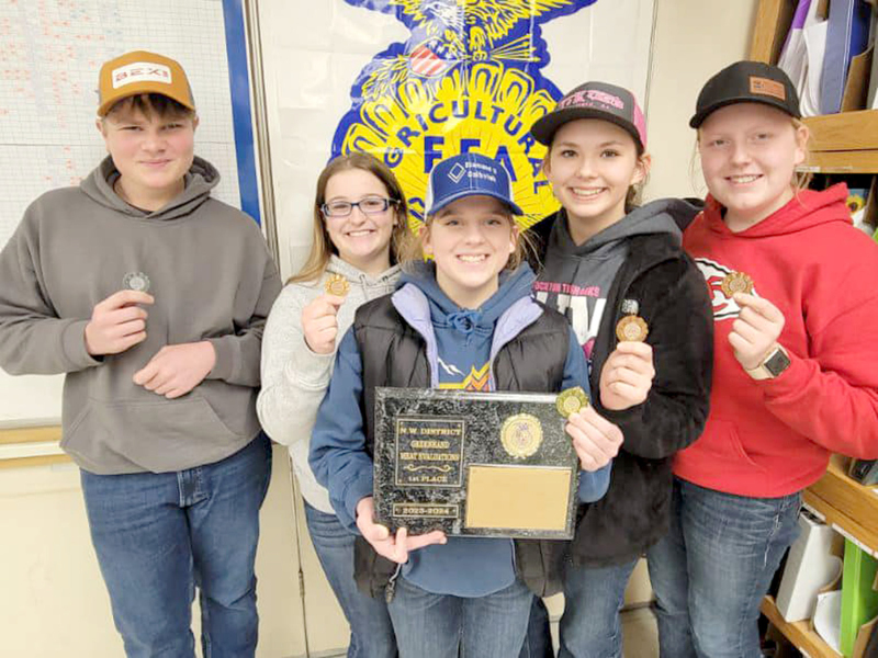 THE STOCKTON FFA GREENHAND TEAM took gold at the FFA Meats Judging competition in Grinnell on Saturday, February 3rd. Pictured holding their medals and first place plaque are (from left) Kolby Dix, Skylar Amlong, Mia Odle, Shae Yohon, and Brenna Odle.