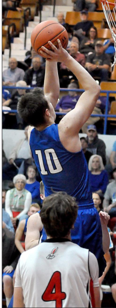 SCORING TWO MORE POINTS for the Tigers is junior Ethan Means. Means finished game against Greeley County with 14 points.
