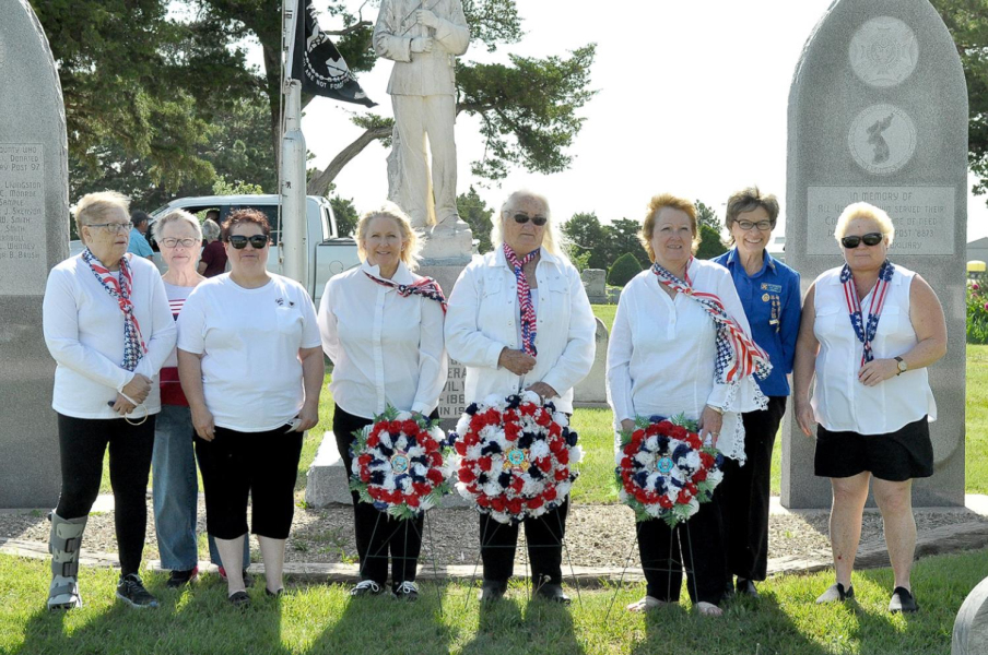 VFW AUXILIARY POST 8873 members present for the Memorial Day Services at Stockton Cemetery were from left: Vicki Peterson, Linda Colburn, Dena Bouchey, Lisa Gilmore, Kathy Creighton, Jari Atwood, Deb Niermeier, and Deb Schellinger.