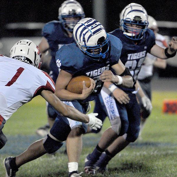 ZACH YOUNG broke several tackles en route to his touchdown run against Logan/Palco on Friday evening at Tiger Stadium.