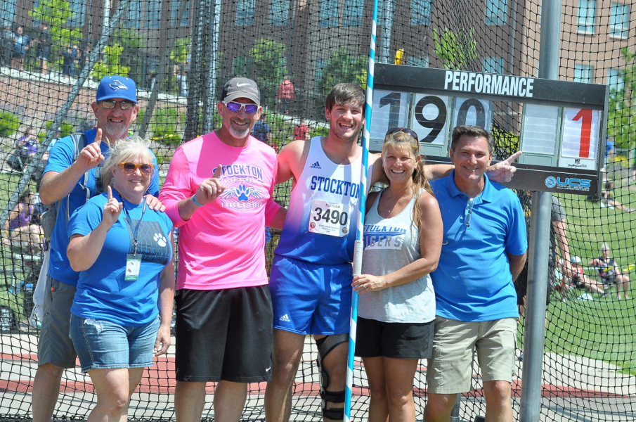 RYLAN BASART CELEBRATES WINNING THE CLASS 1A STATE CHAMPIONSHIP on Saturday with his family and coach ,following a PR throw of 190-01. Pictured at Cessna Stadium in Wichita are, from left, his dad, Justin and Bobbi Basart, Coach Clint Bedore, Rylan, and his mom, D’Ann and Rick Gardner.