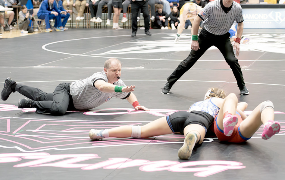 ASHLYN WINS by a fall over Averie Counts of Russell to cap off her undefeated season and earn her the 3-2-1A state title.