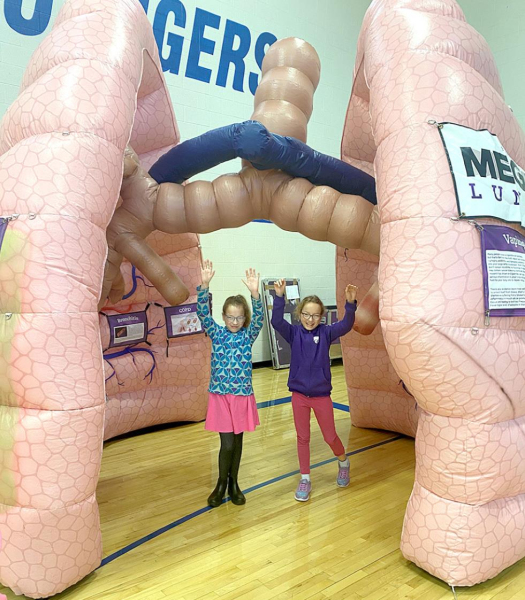 STOCKTON FIFTH-GRADE STUDENTS Jade and Kaylee Jackson pose inside the MEGA Lungs, which were on display in Stockton on Wednesday, January 12th. The students enjoyed learning about how the lungs function and general lung health.