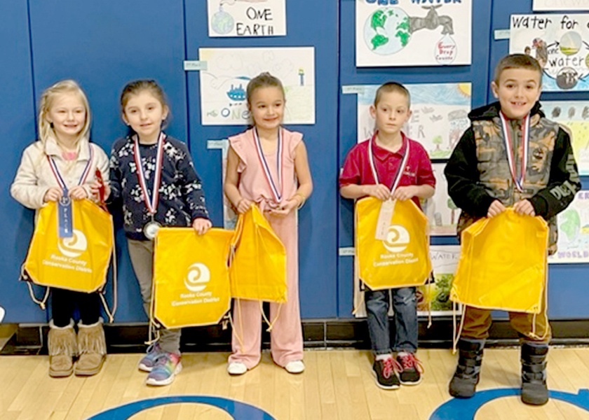 FIRST-GRADE POSTER WINNERS from Rooks County for 2023 include, from left: 1st Place, Kabree Benoit, Damar Elementary; 2nd Place, Presley Pfaff, Plainville Elementary; 3rd Place, Blake Hrabe, Sacred Heart; 4th Place, Delaney Lawver, Sacred Heart; and Honorable Mention, Sammie Johnson, Plainville Elementary.