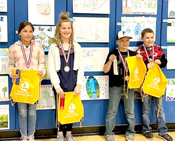 THIRD-GRADE POSTER WINNERS from Rooks County for 2023 include, from left: 1st Place, Hannah Gosselin, Damar Elementary;2nd Place, Hayley Bacon, Plainville Elementary;3rd Place, Brody Axelson, Plainville Elementary; and 4th Place, Grant Atchison, Plainville Elementary.