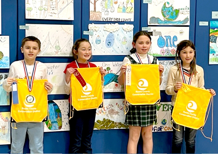 FOURTH-GRADE POSTER WINNERS from Rooks County for 2023 include, from left: 1st Place, Brogan Pfaff, Plainville Elementary; 2nd Place, Leilah Slaubaugh, Sacred Heart; 3rd Place, Brooke Benoit, Damar Elementary; and 4th Place, Kaydence Tremblay, Sacred Heart.