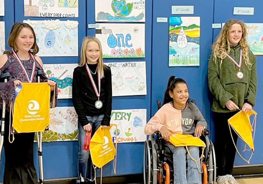 FIFTH-GRADE POSTER WINNERS from Rooks County for 2023 include, from left: 1st Place, Nevaeh Garrett, Plainville Elementary; 2nd Place, London Waggoner, Plainville Elementary; 3rd Place, Elizabth Coates, Damar Elementary; and 4th Place, Xoey Stewart, Plainville Elementary.