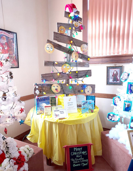 THE STOCKTON PUBLIC LIBRARY BOARD’S CHRISTMAS TREE is one of the 25 trees on display in the Carnegie Room of the library. Make time to come see all of the unique trees and decorations at the 37th annual Parade of Christmas Trees.