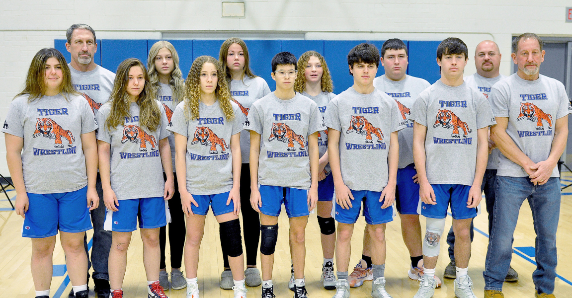 MEMBERS OF THE 2022-23 STOCKTON HIGH SCHOOL WRESTLING TEAM are from left: Rivver Long, Coach Clint Bedore, (Jadyn Palmer), Karleigh Horn (mgr.), Temprance Northup, Neveah Ray (mgr.), Carolina Northup, Ashlyn Hahn, Cameron Balthazor, Ryan Mongeau, Emerson Lowry, Coach Tyler Hahn, and Coach Justin Basart. Not pictured are Shyanne Balthazor, and managers Mia Odle and Camille Lowry.