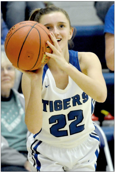 SHS SENIOR LADY TIGER TATUM HAMILTON is all smiles as she lines up one of her two 3’s against LaCrosse last Tuesday, February 18th, in Stockton.