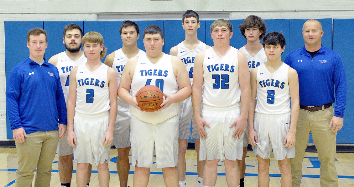 MEMBERS OFTHE 2022-23 STOCKTON HIGH SCHOOL BOYS BASKETBALLTEAM are from left: Coach Trevor Miller, Jaxon Dunlap, Hayden Hilbrink, Zach Young, Ryan Mongeau, Jack Gasper, Skylar King, Max Moffet, (Cameron Balthazor), and Coach Don Moffet.